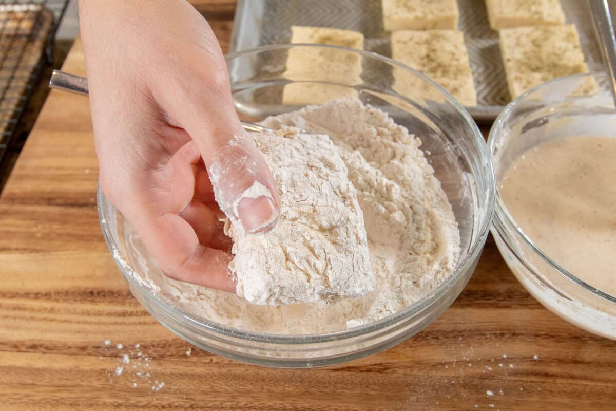 coating the tofu in the dry mixture
