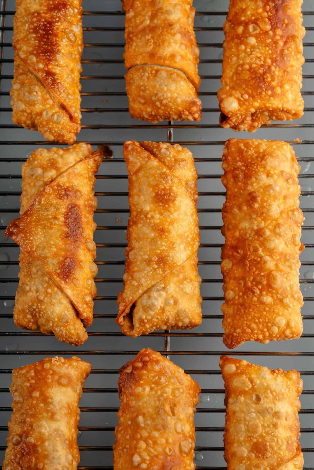 fried egg rolls on a wire rack