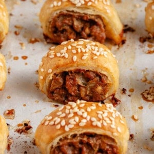 close up of sausage rolls on the baking sheet