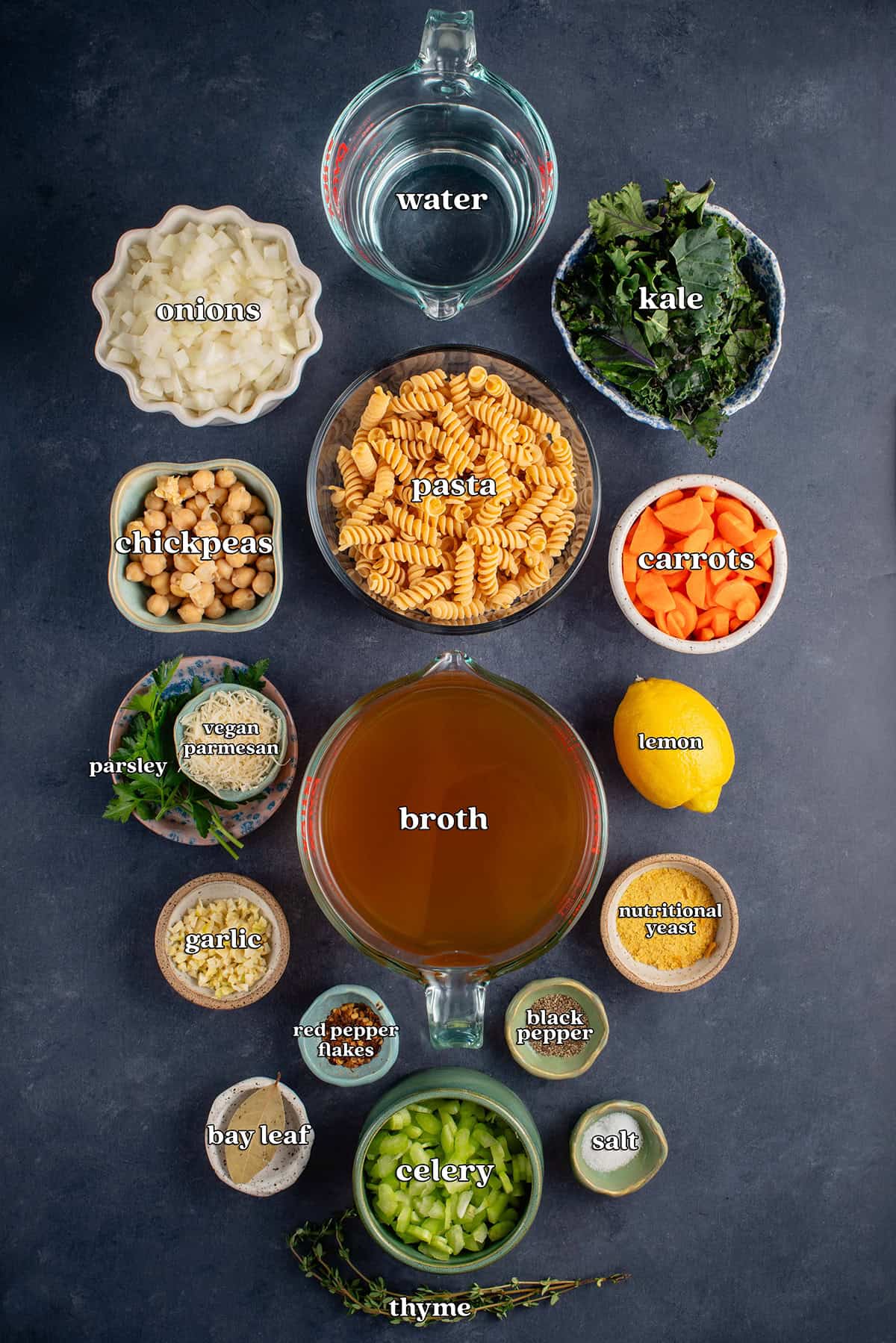 water, onions, kale, pasta, chickpeas, carrots, parsley, vegan parmesan, broth, lemon, garlic, nutritional yeast, red pepper flakes, black pepper, bay leaf, celery, salt, thyme