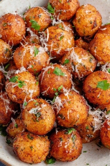 close up of bowl full of vegan Crispy Potato Balls
