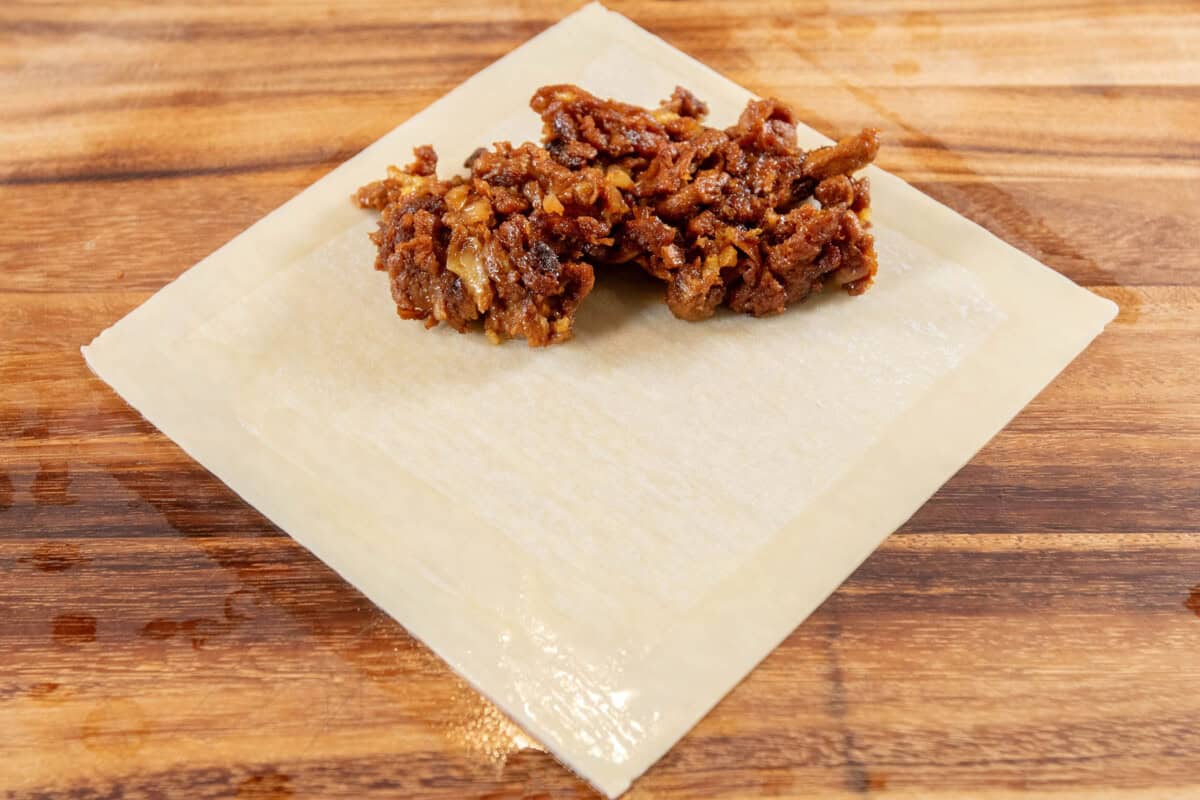 filling added to the egg roll wrapper