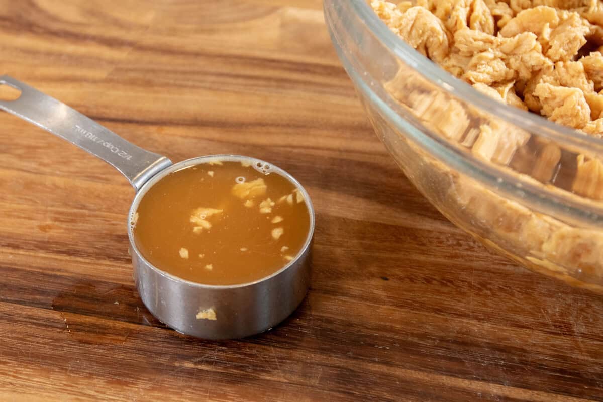 reserved broth in a measuring cup