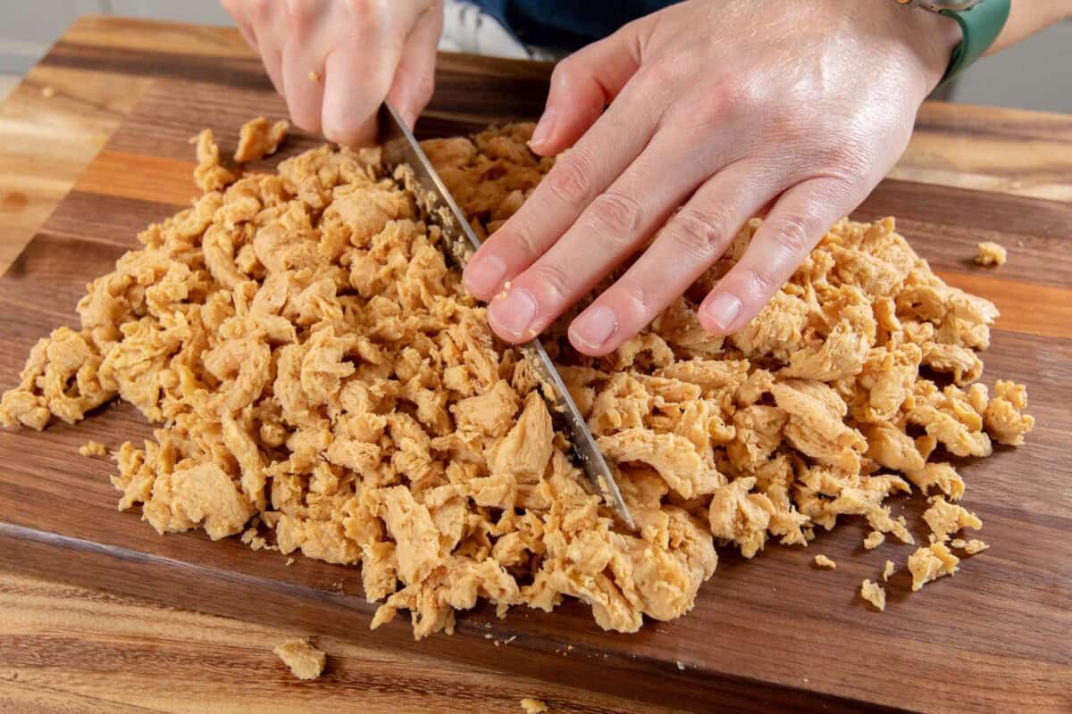 chopping soy curls into smaller pieces