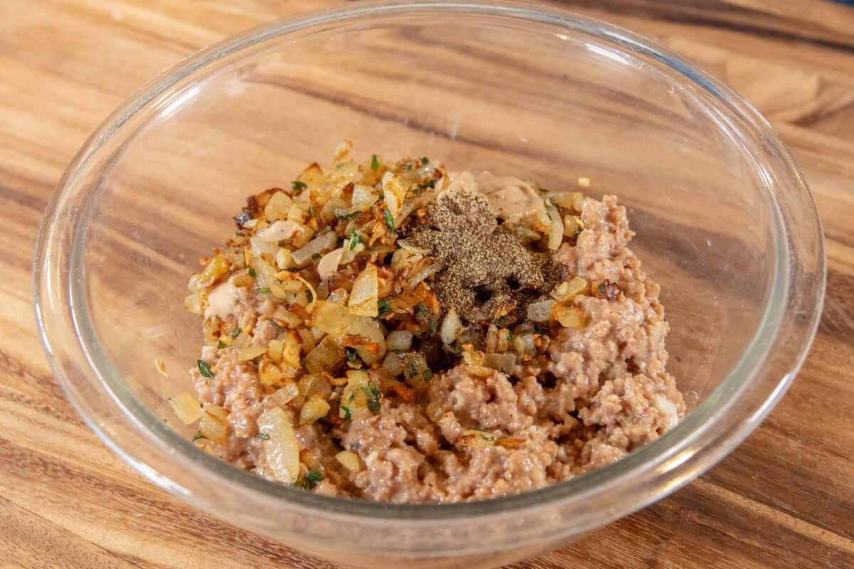 bowl of vegan sausage with onion mixture