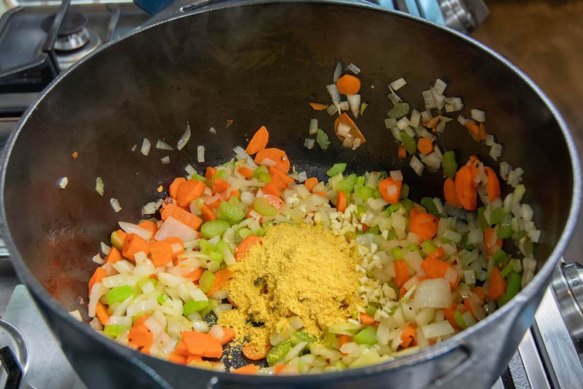 adding nutritional yeast to the pot