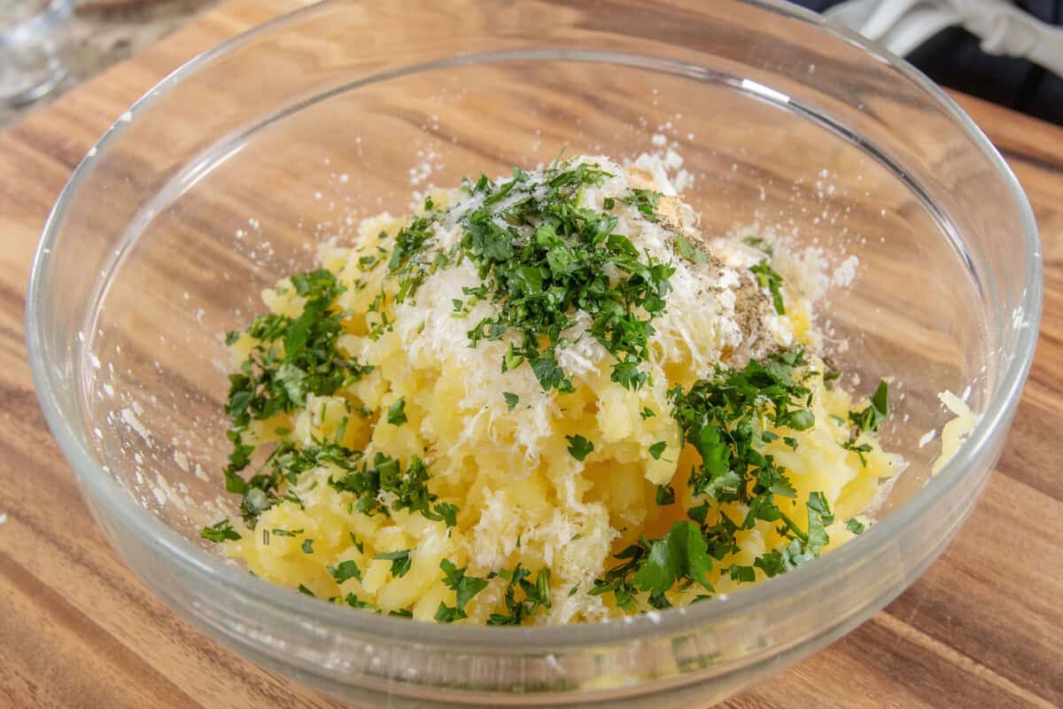 ingredients for Crispy Potato Balls in glass bowl before mixing