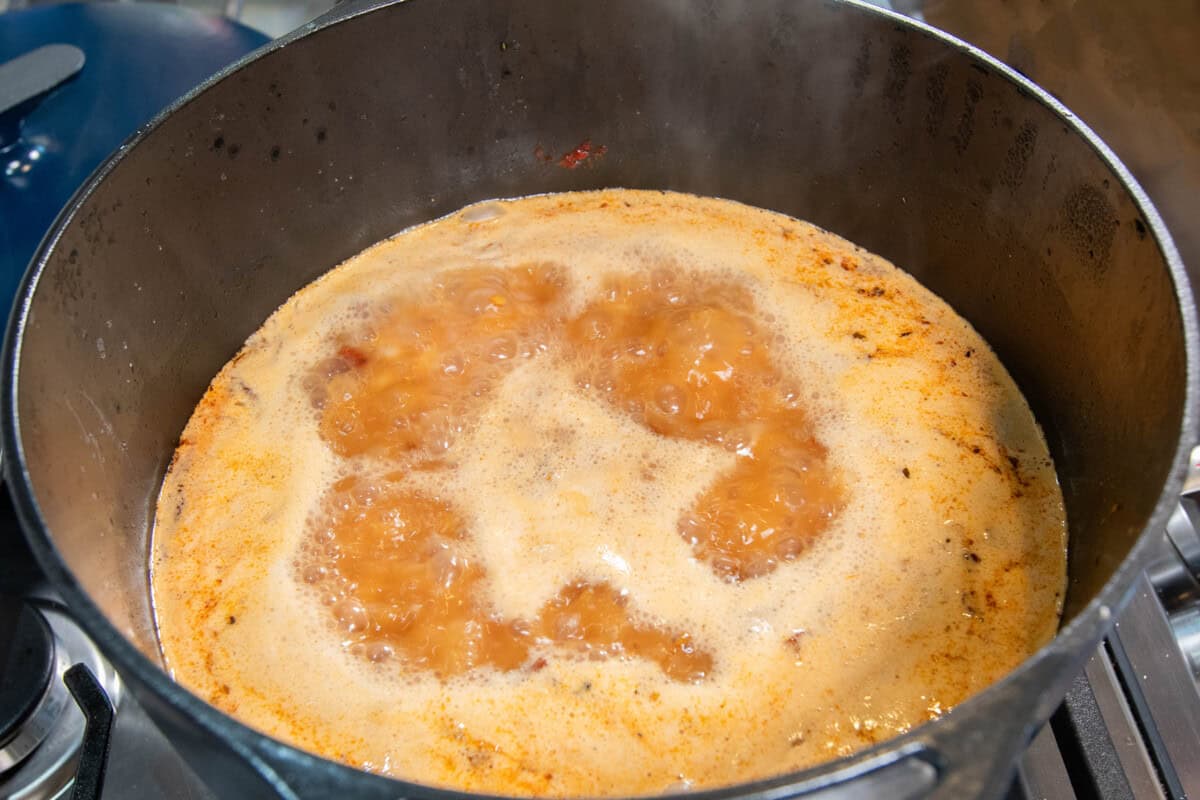 simmering soup in large pot