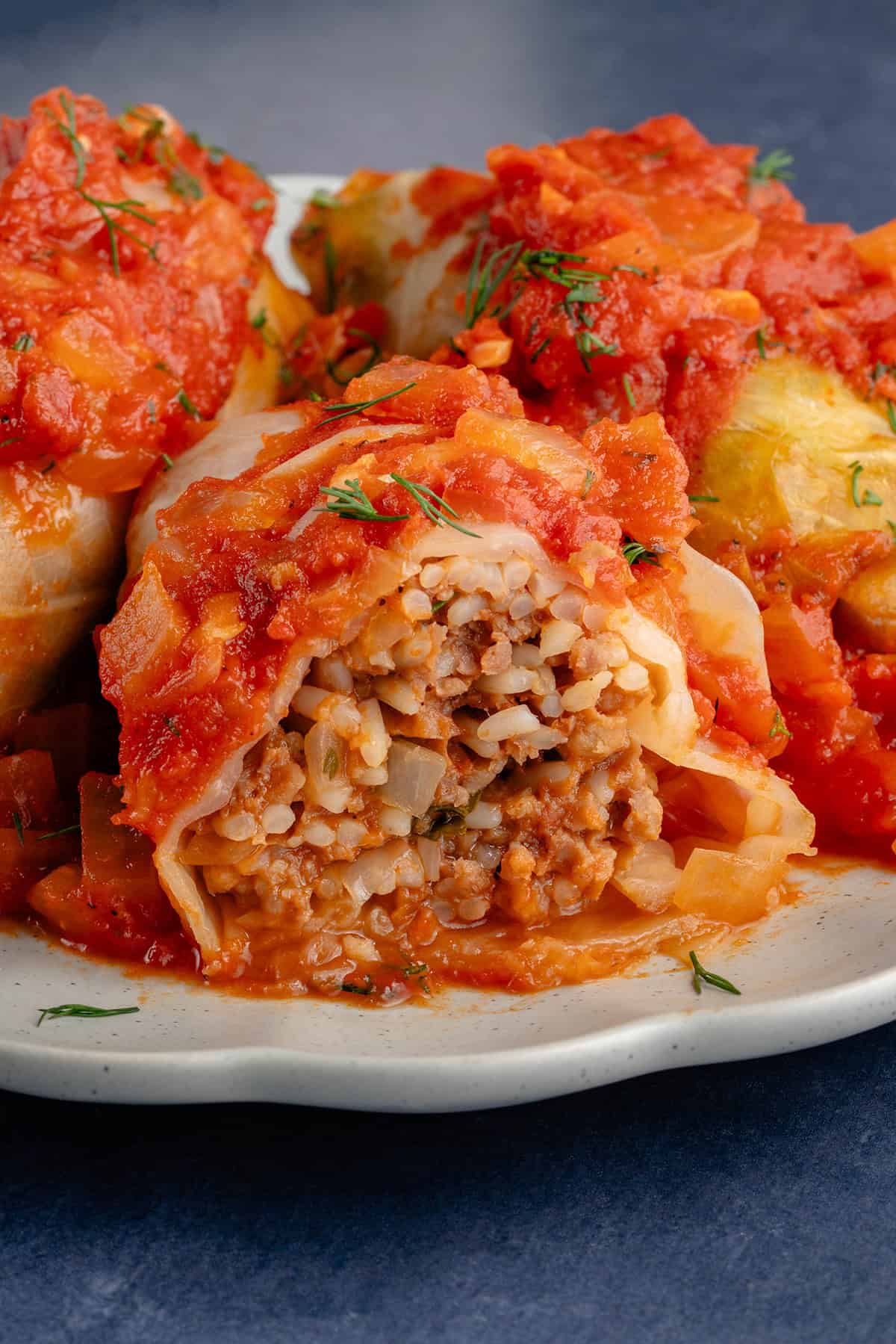 close up of vegan stuffed cabbage rolls on plate