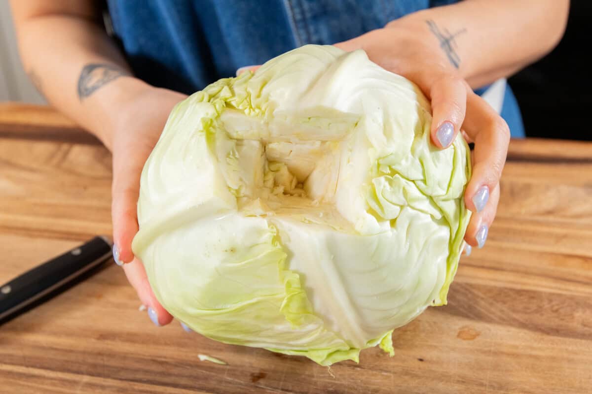showing a whole cabbage with the core cut out