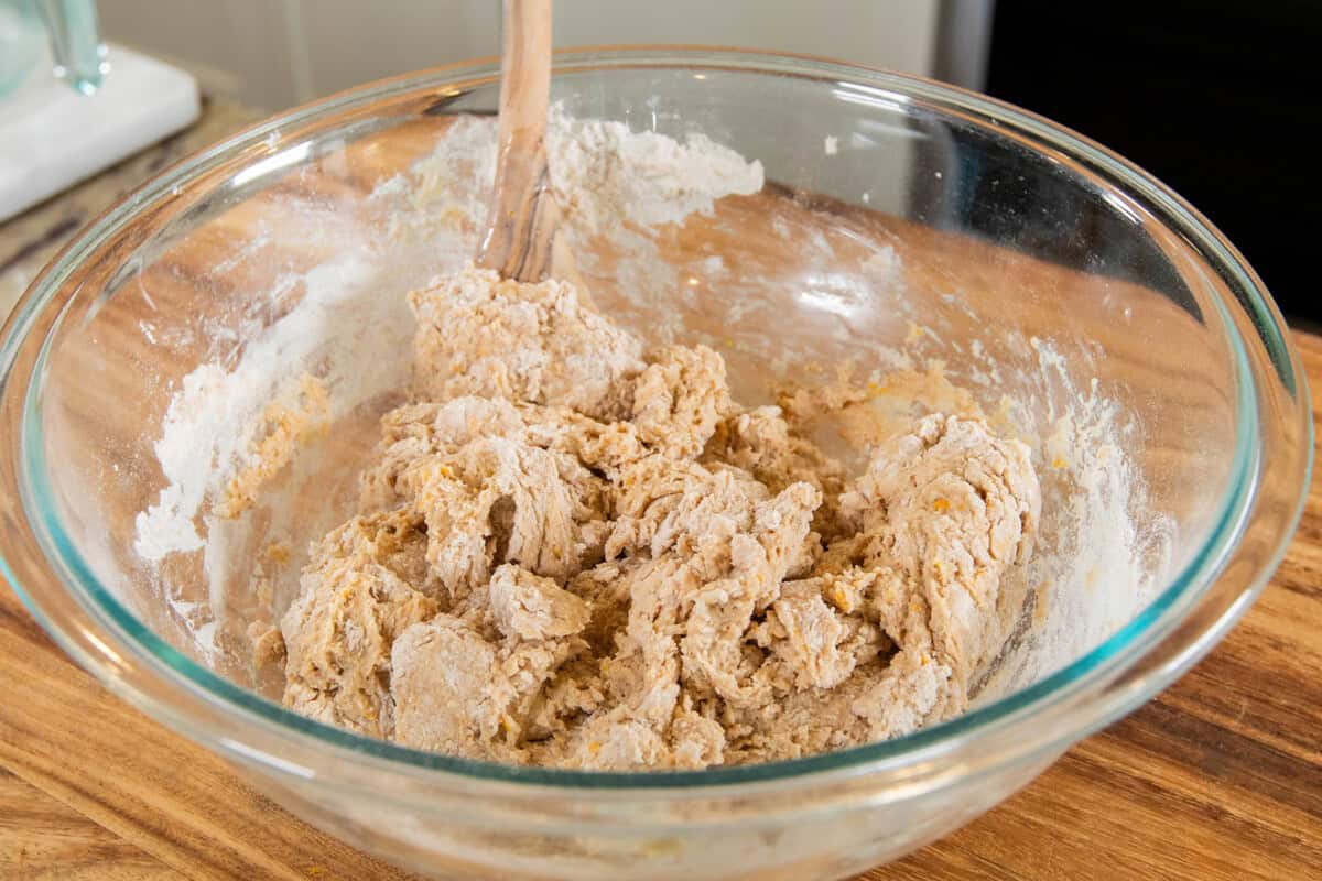 mixing dough in a large bowl