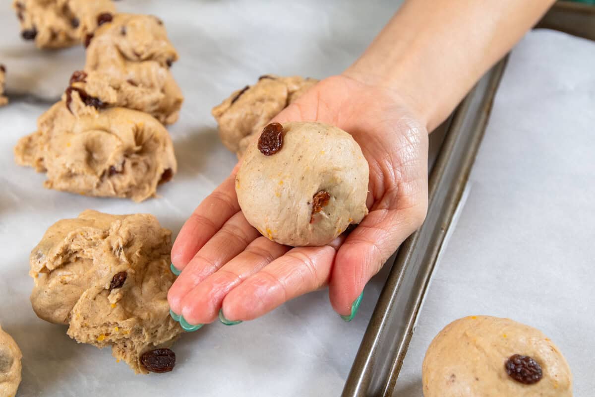 rolling buns into small balls