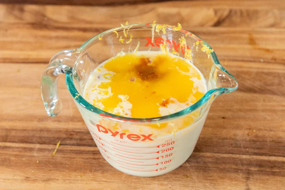 combining wet ingredients in measuring cup