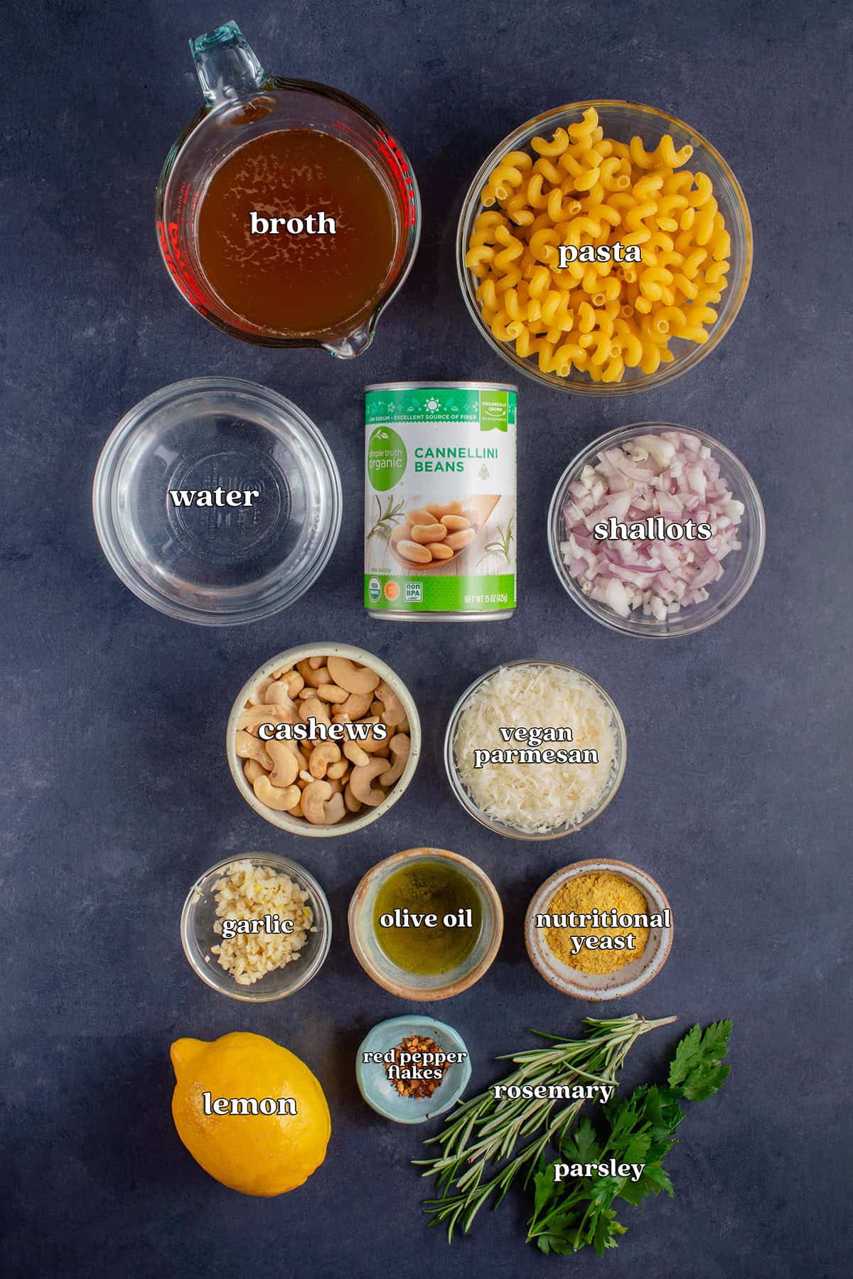 broth, pasta, water, cannellini beans, shallots, cashews, vegan parmesan, garlic, olive oil, nutritional yeast, lemon, red pepper flakes, rosemary, parsley