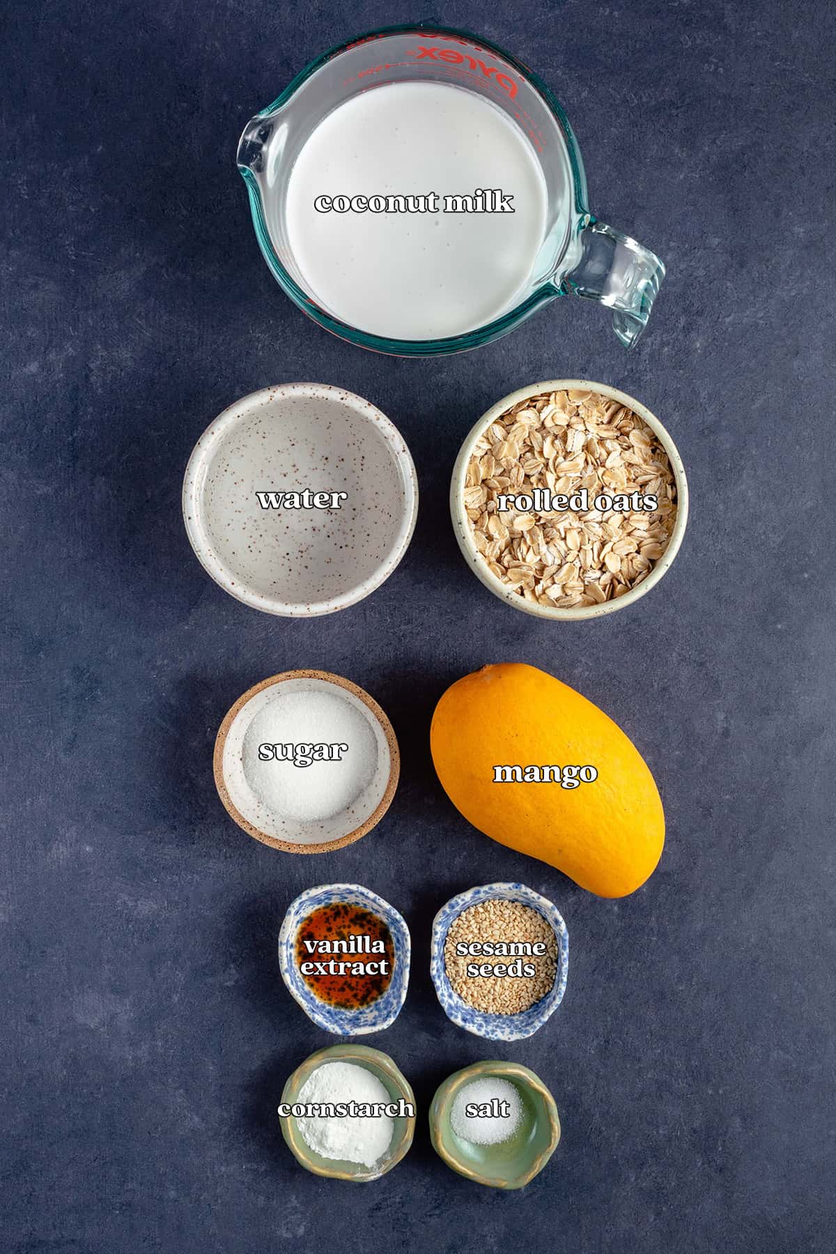 coconut milk, water, rolled oats, sugar, mango, vanilla extract, sesame seeds, cornstarch, salt