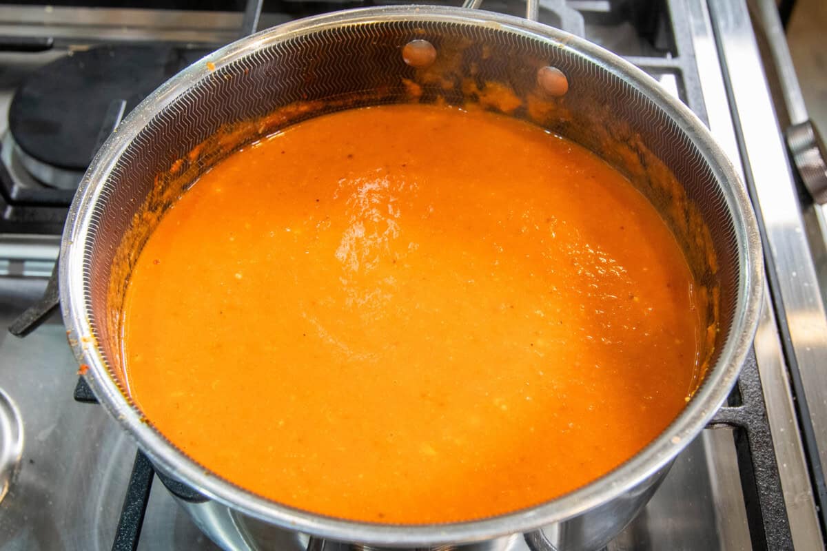 pot of vodka tomato soup on stove top