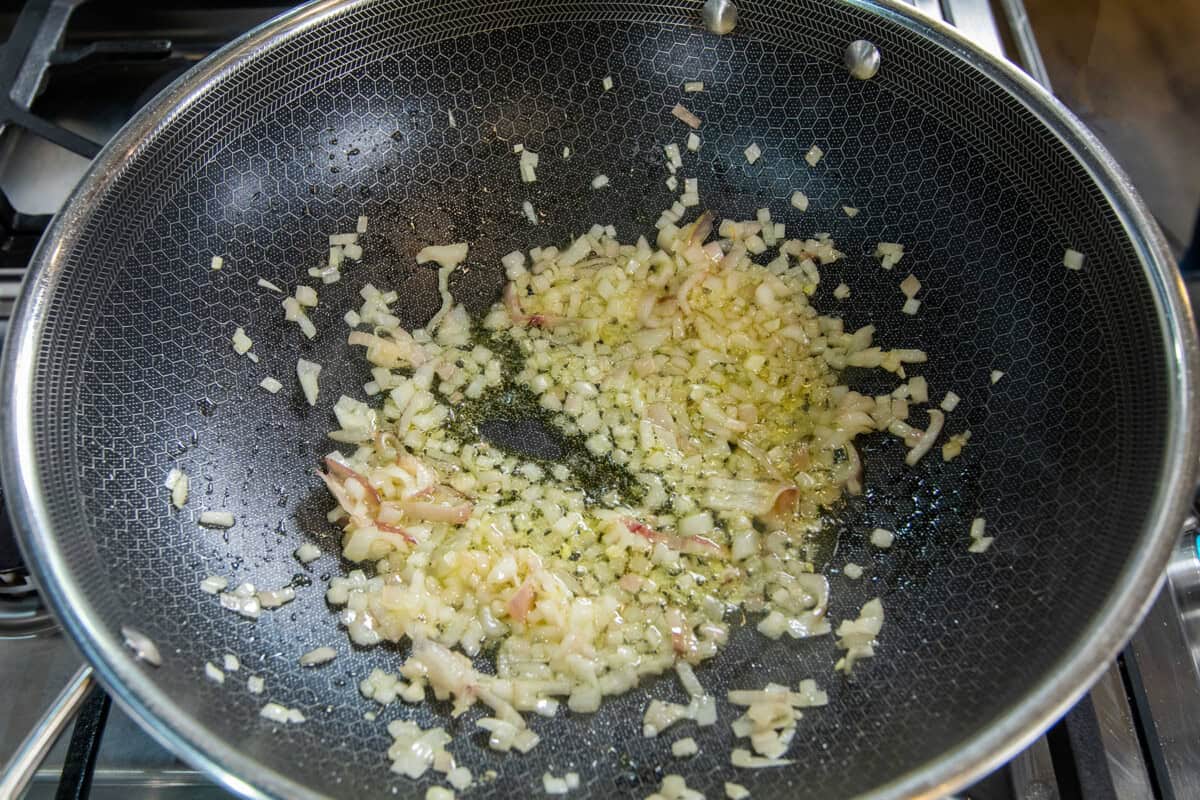 sautรฉing shallots and garlic