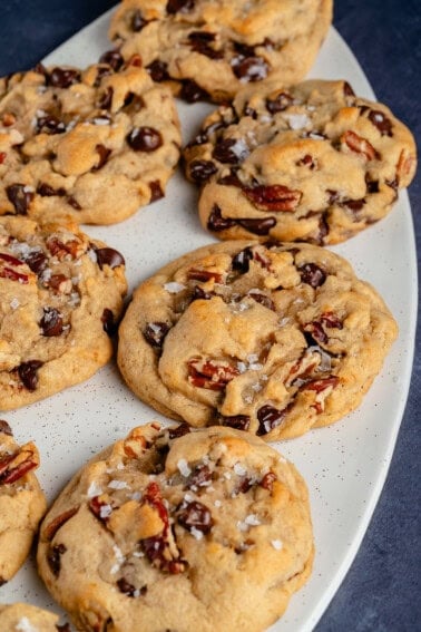 Chunky Chocolate Chip Pecan Cookies on white platter