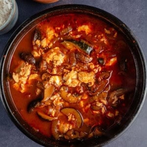 Vegan Sundubu-Jjigae (Korean Soft Tofu Stew) in earthenware pot