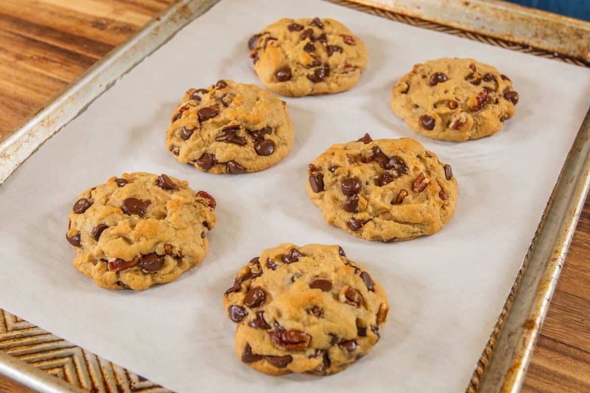 baked cookies on a lined baking sheet