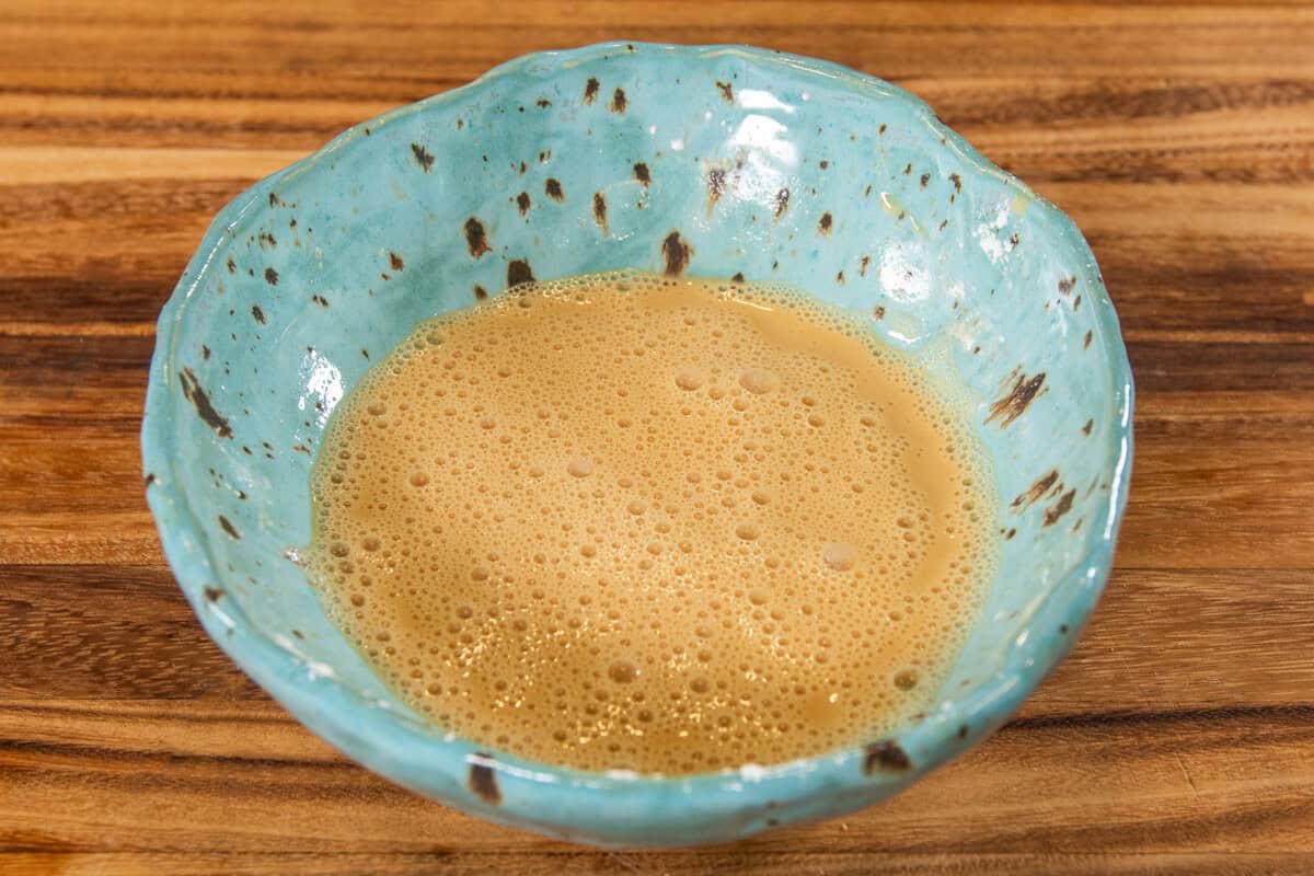 wet mixture in a blue bowl
