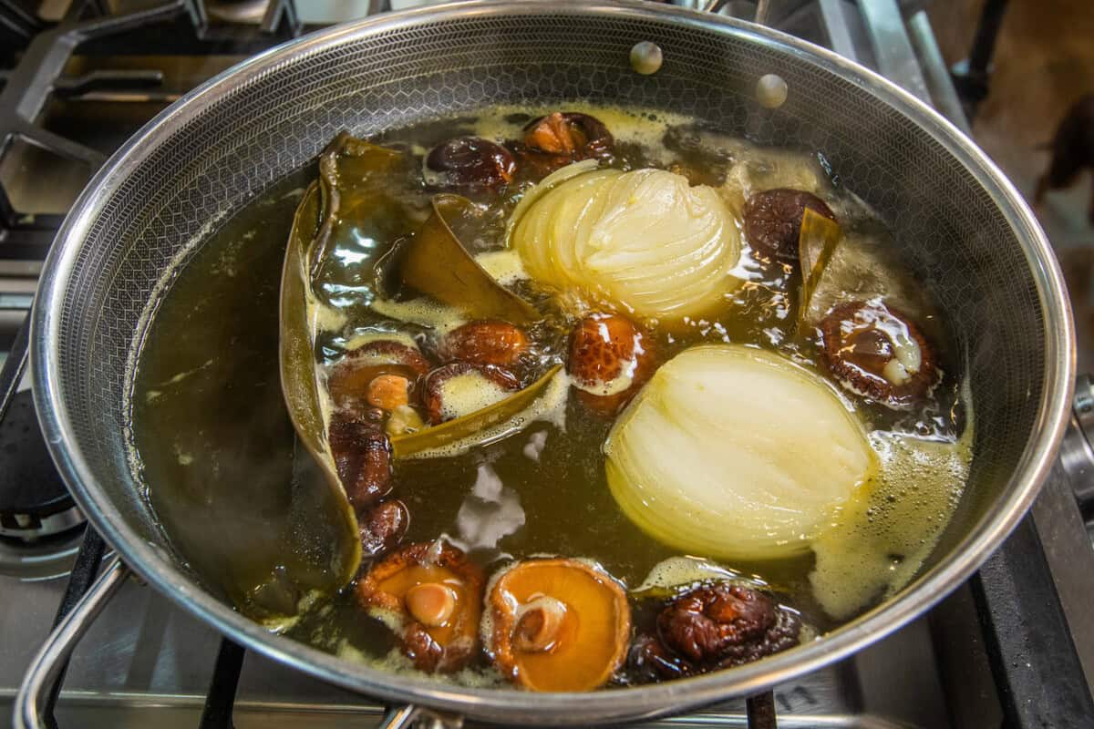 simmering veggies to make broth in pot