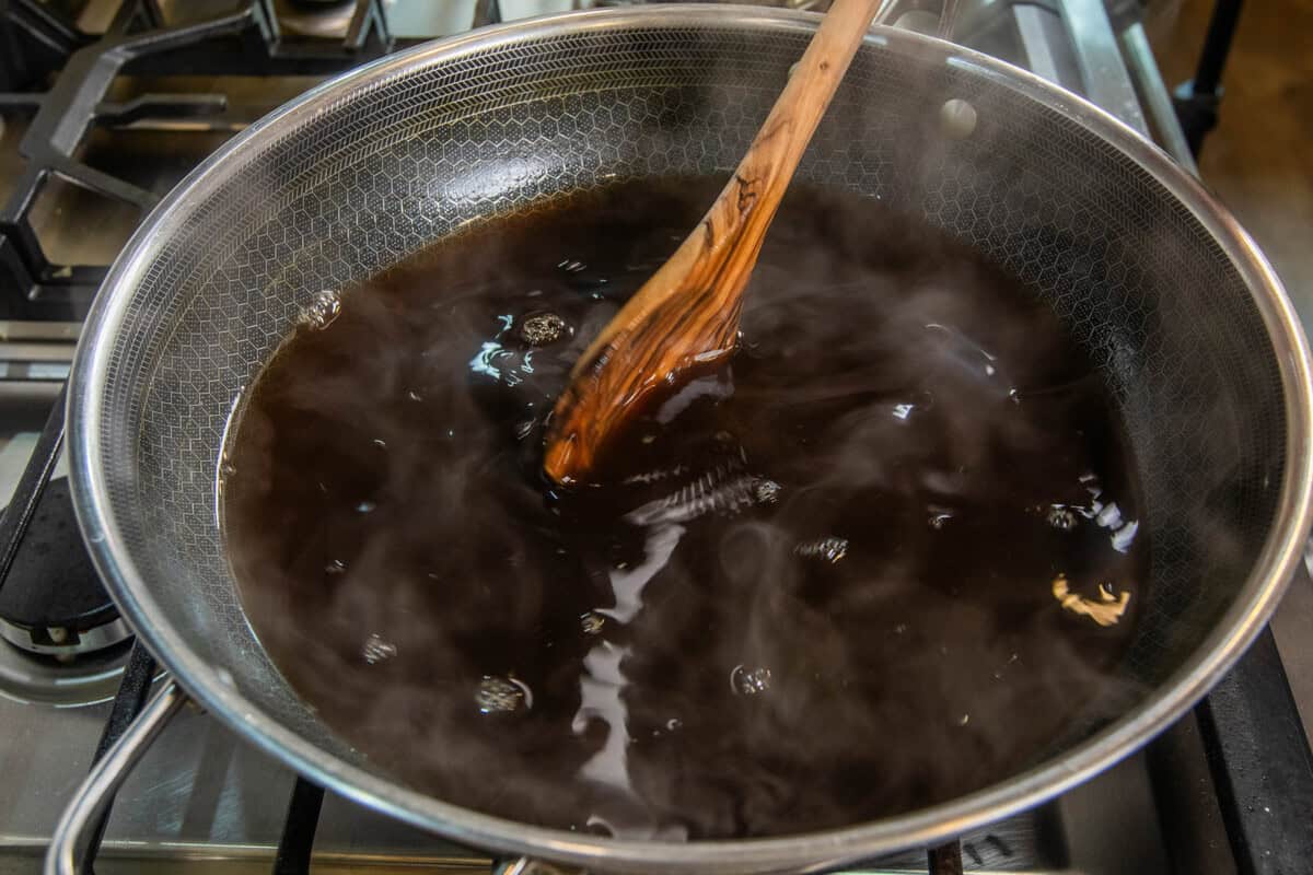 mixing broth in pot