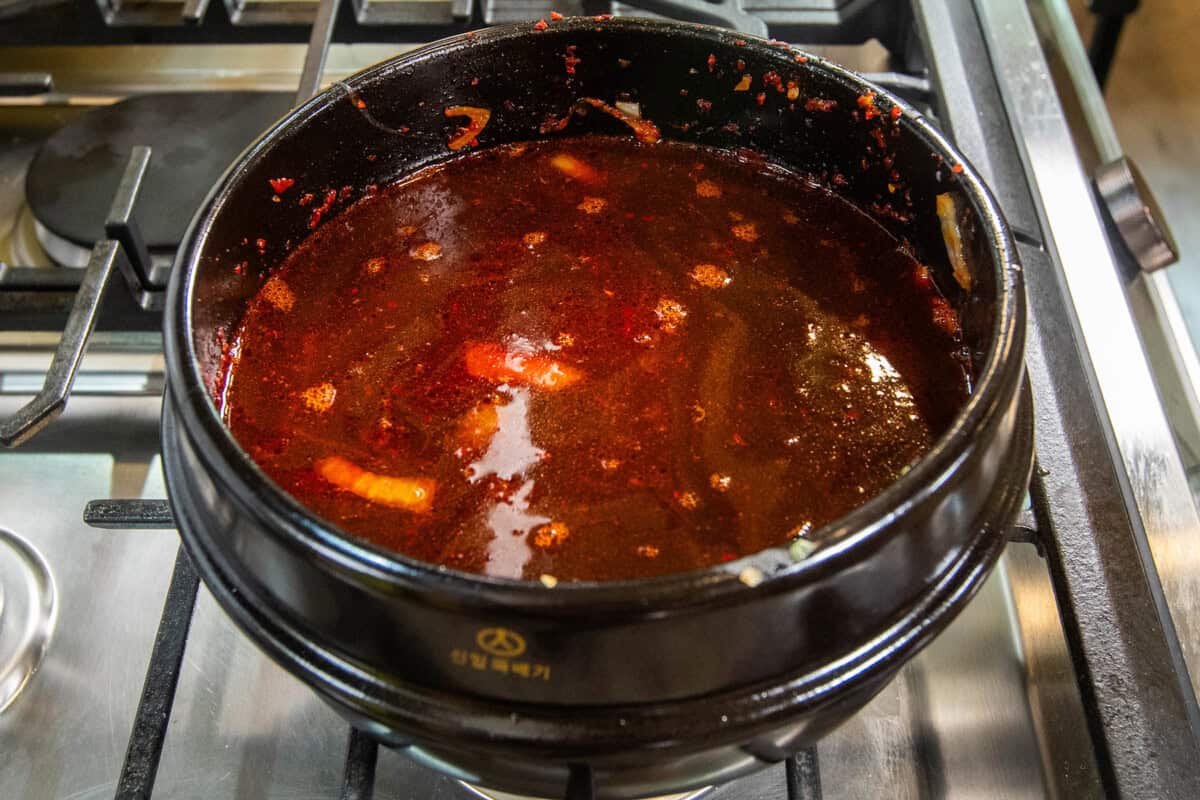 added broth to pot