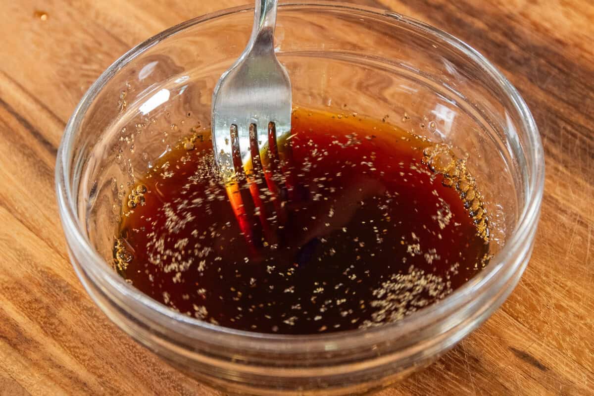 mixing sawsawan with a fork