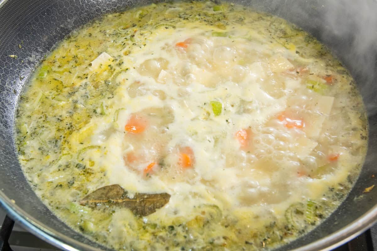 simmering veggies in a large pot
