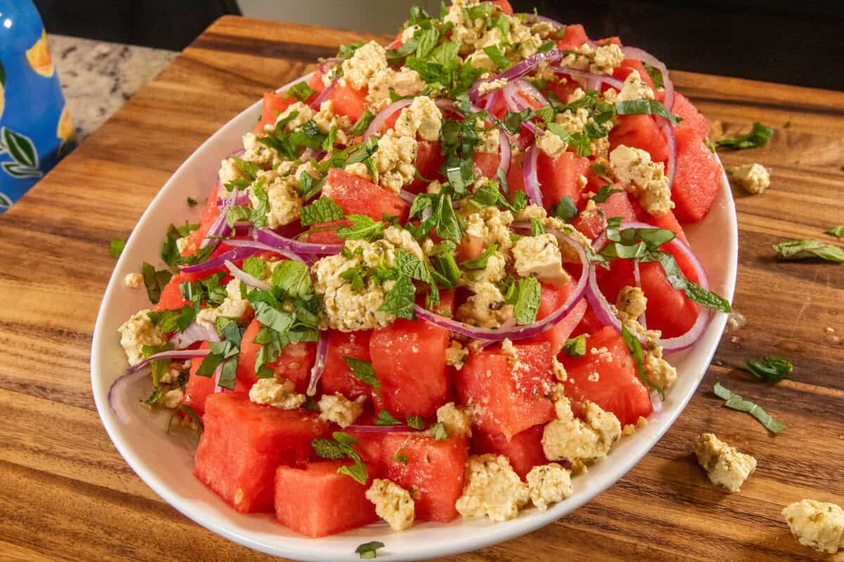 adding fresh mint and basil