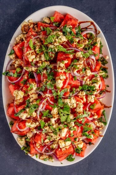 overhead of tofu feta watermelon salad on platter