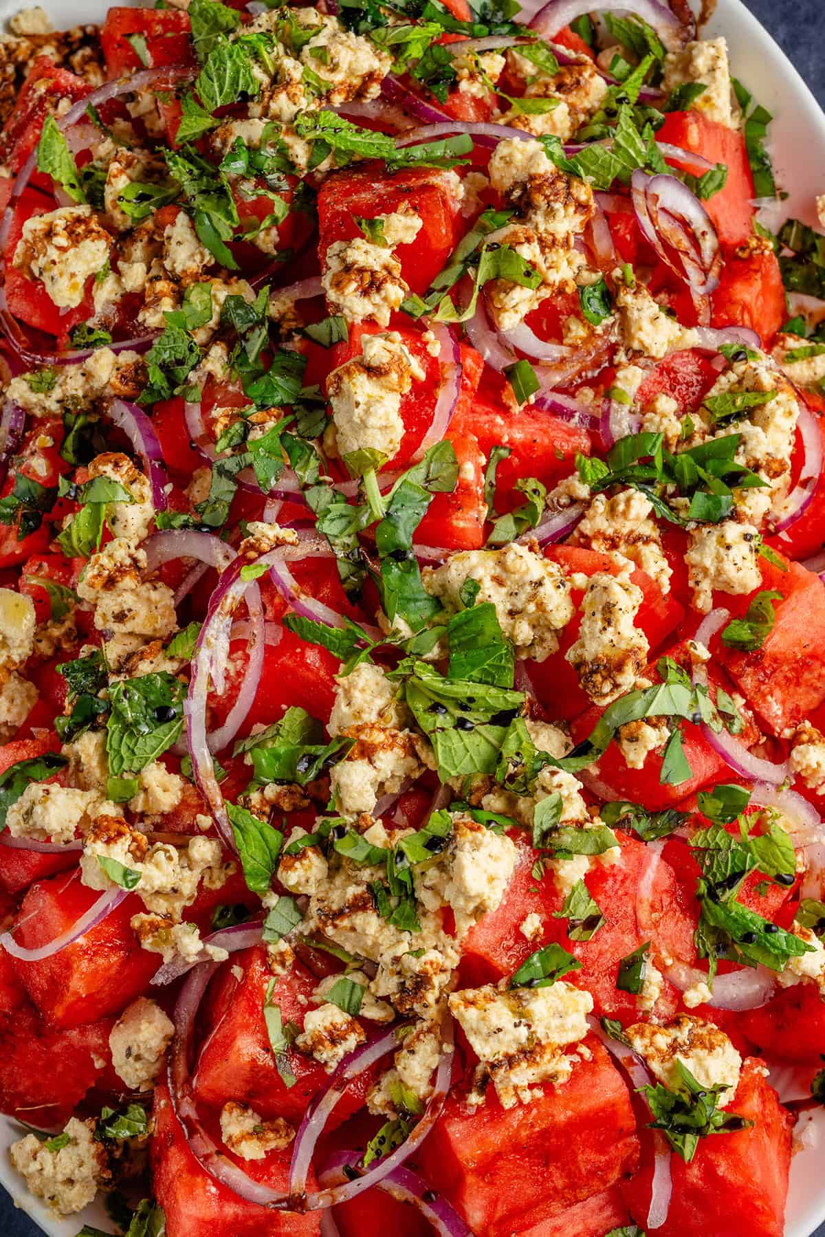 close up of platter of tofu feta watermelon salad