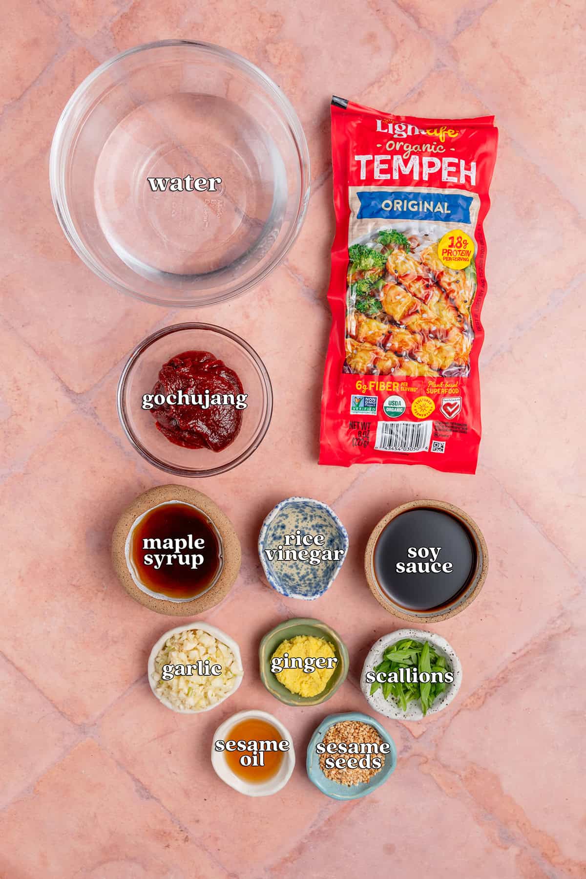 water, tempeh, gochujang, maple syrup, rice vinegar, soy sauce, garlic, ginger, scallions, sesame oil, sesame seeds