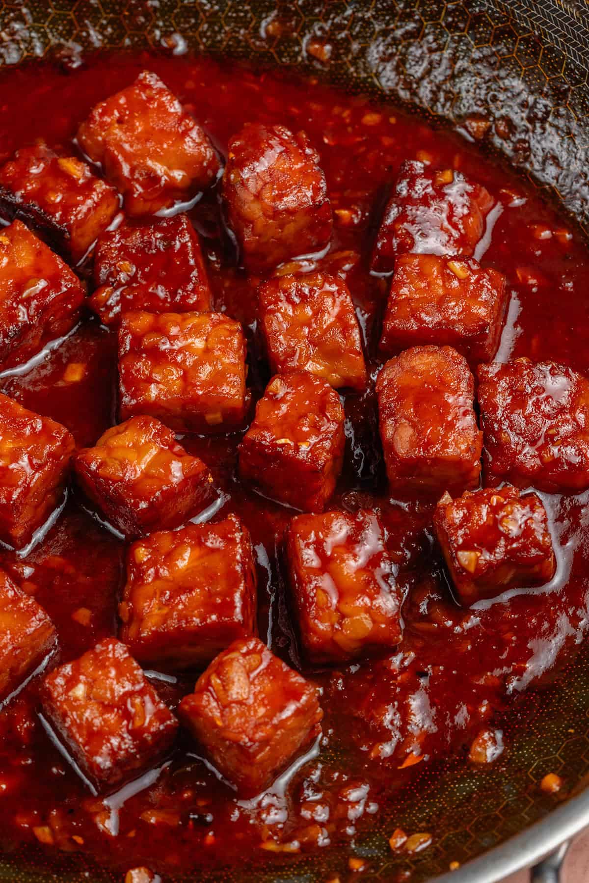 gochujang braised tempeh in a skillet