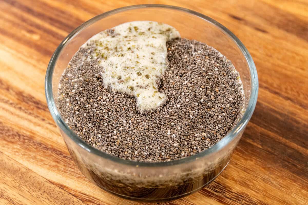 adding chia seeds to the small bowl