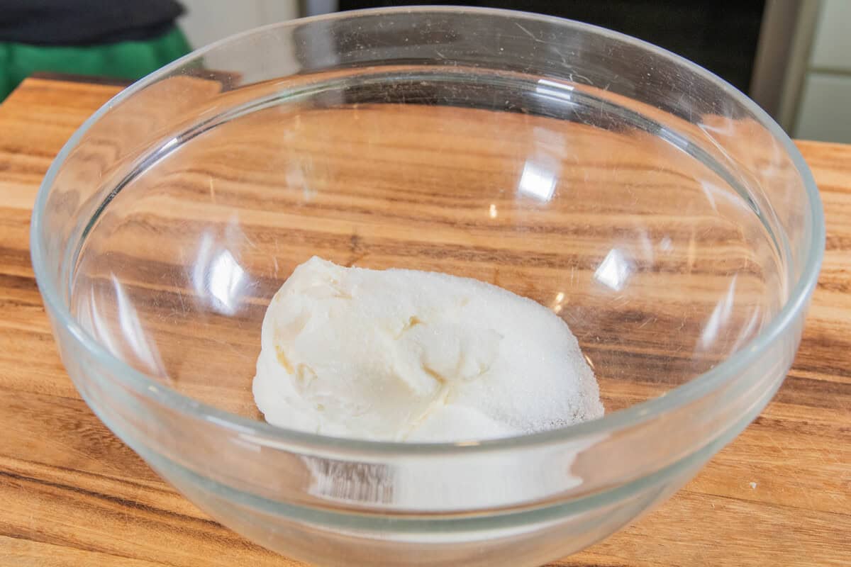 sugar and cream cheese in a large bowl