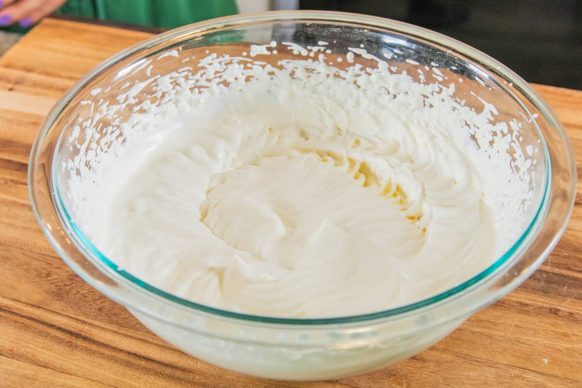 whipped heavy cream in a bowl