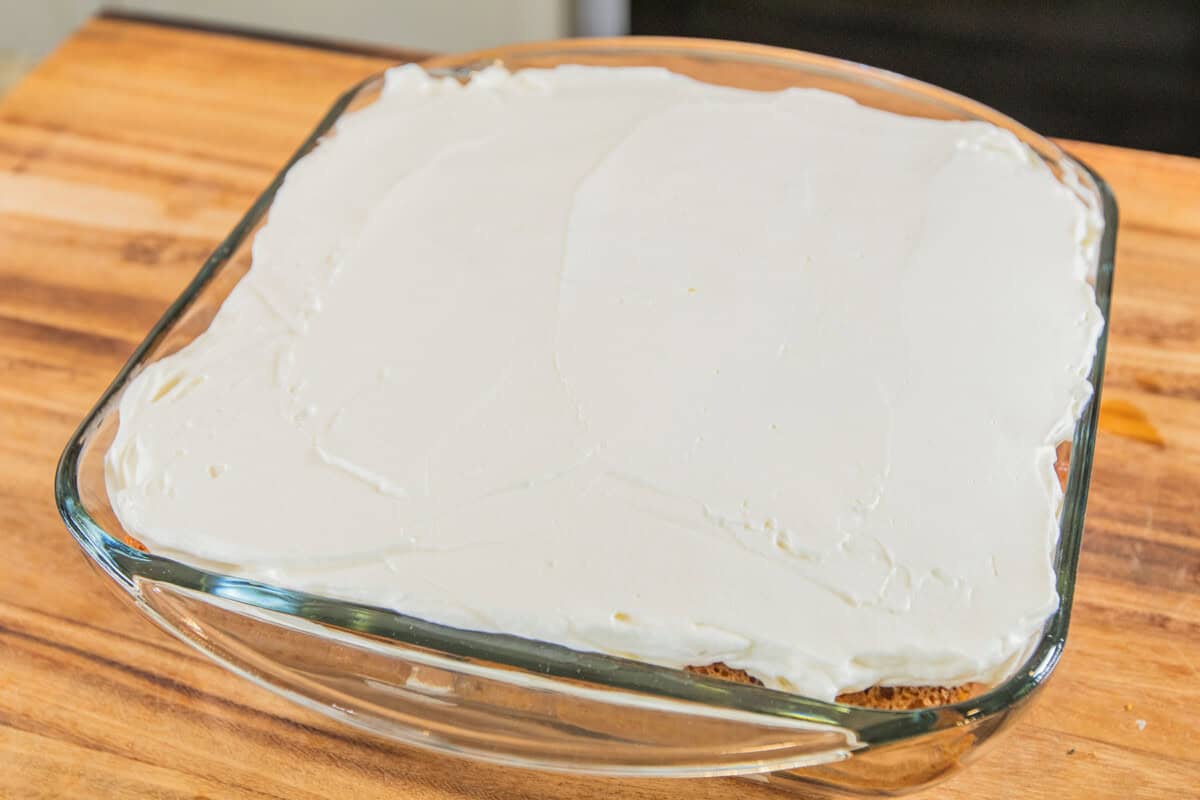 final layer of cream added to the dish