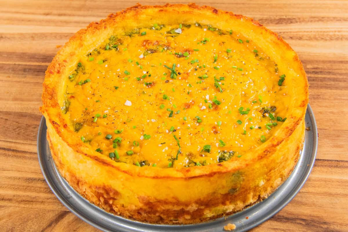 whole potato crust quiche on plate