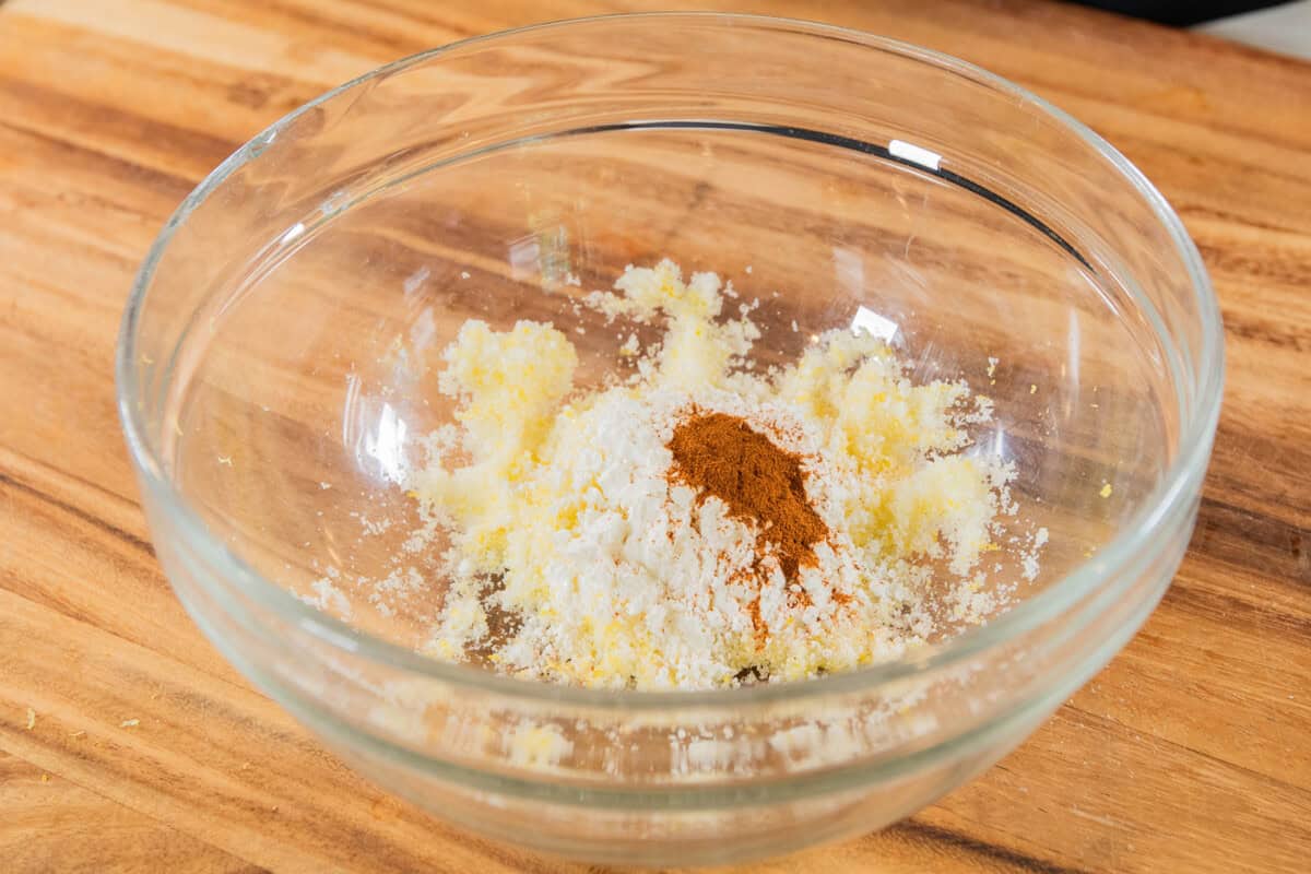 sugar, lemon zest, cornstarch, and cinnamon in a bowl before mixing