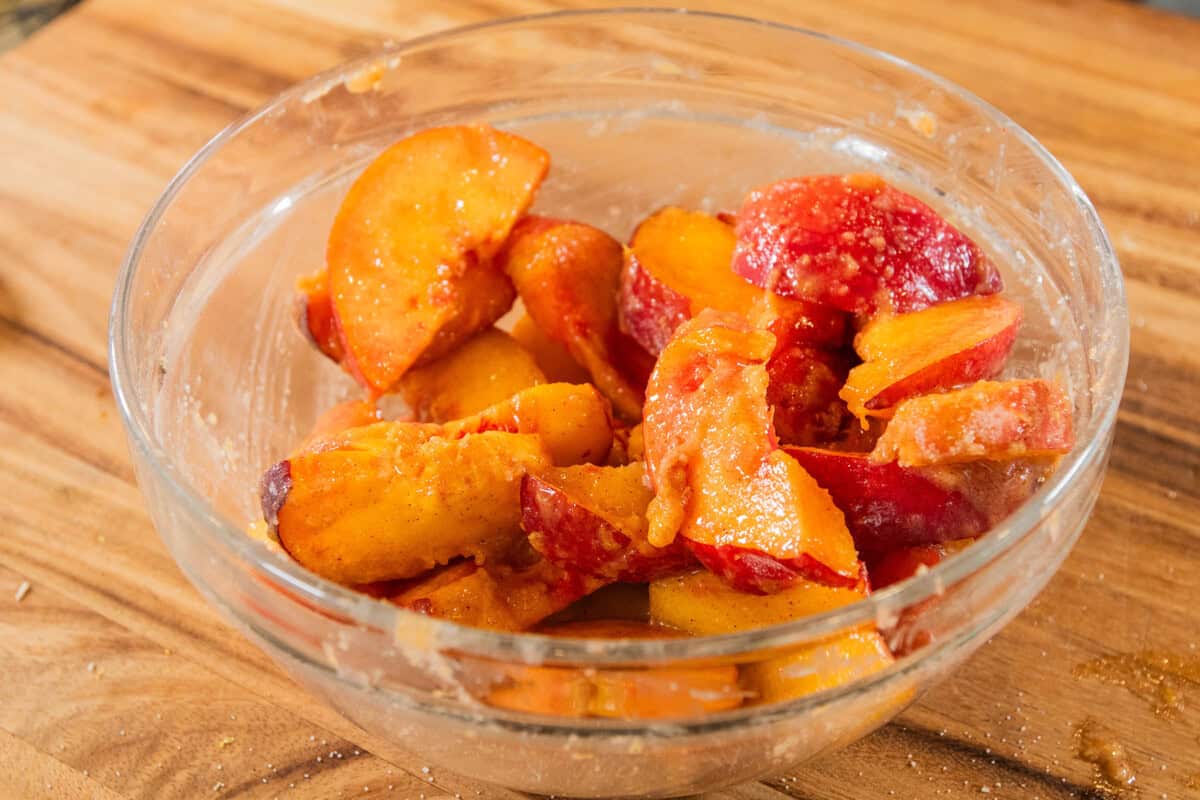 sliced peaches tossed in sugar and cornstarch mixture