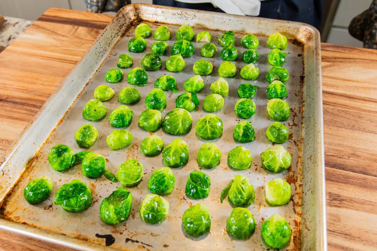 brussels sprouts facing cut side down on baking sheet