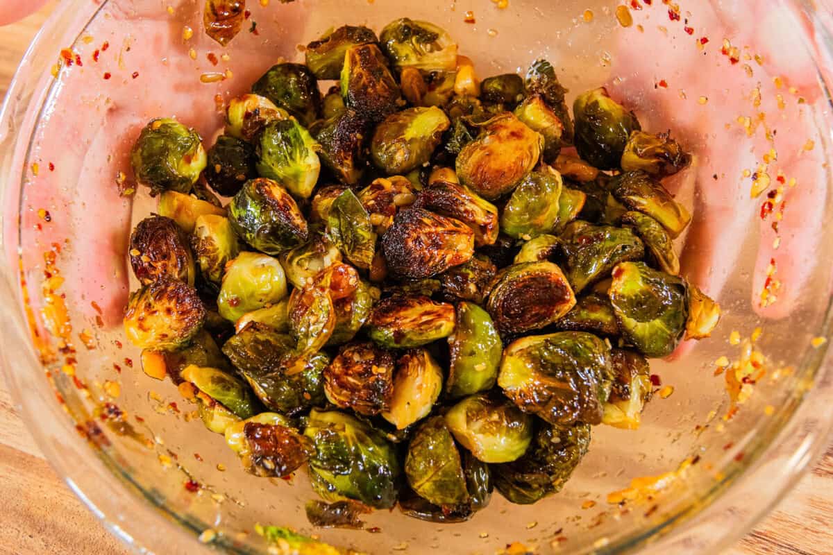 bowl of maple chili crisp brussels sprouts