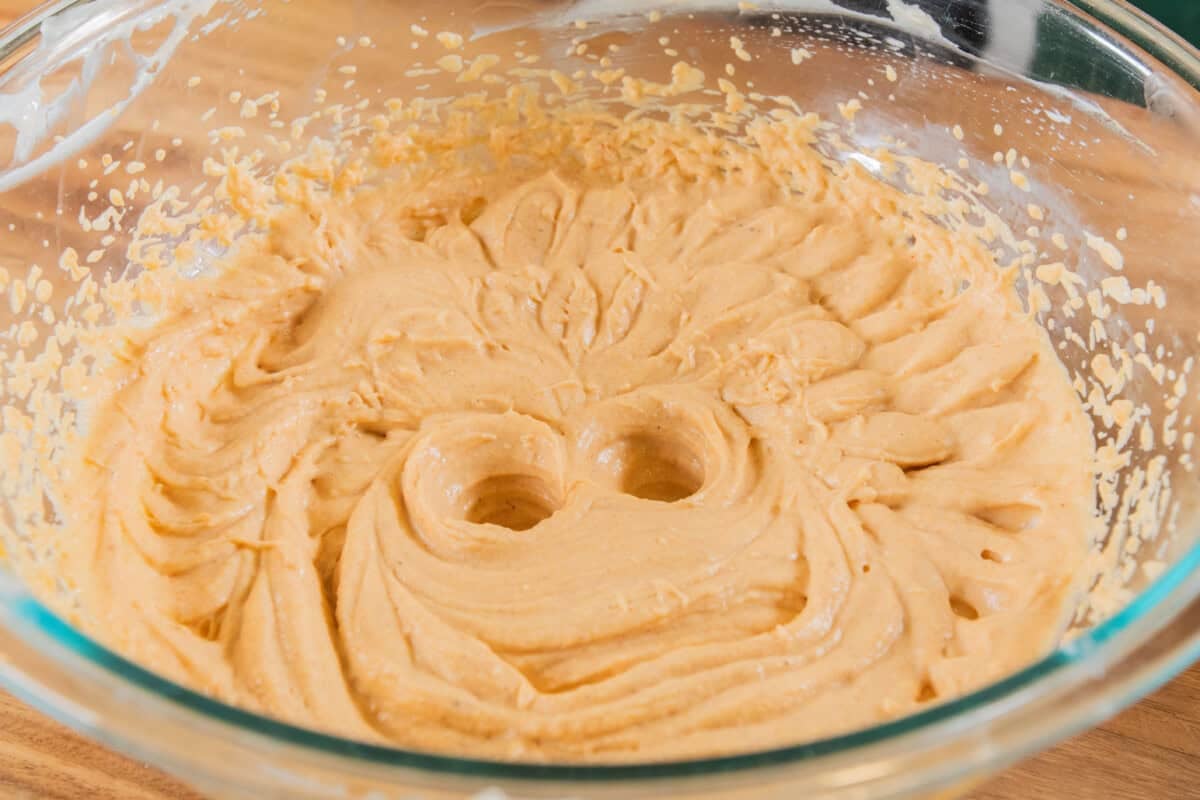 creamy pumpkin filling in glass bowl for pumpkin cheesecake bars