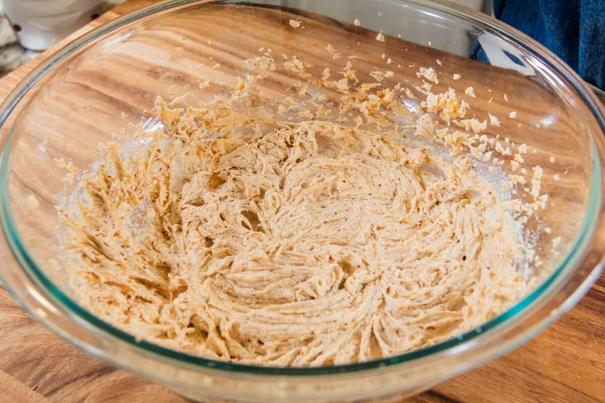 whipped butter and sugar in a large glass bowl