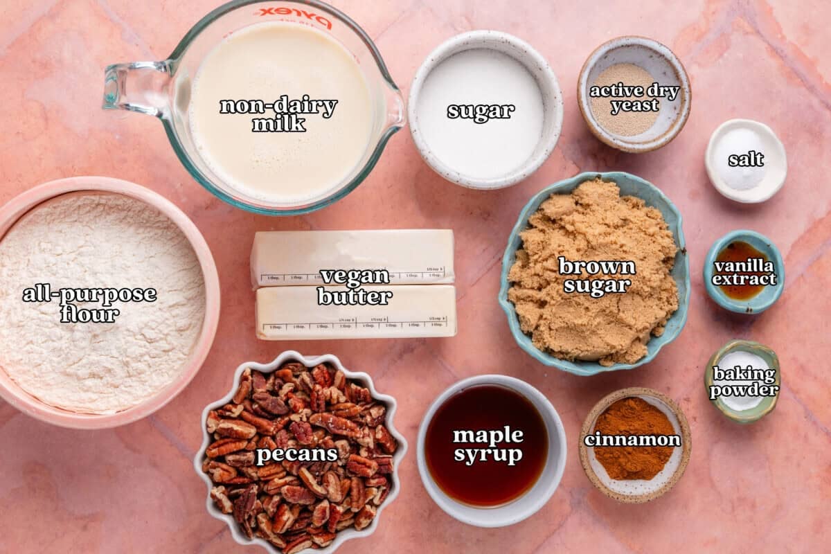 non-dairy milk, sugar, active dry yeast, salt, all-purpose flour, vegan butter, brown sugar, vanilla extract, pecans, maple syrup, cinnamon, baking powder
