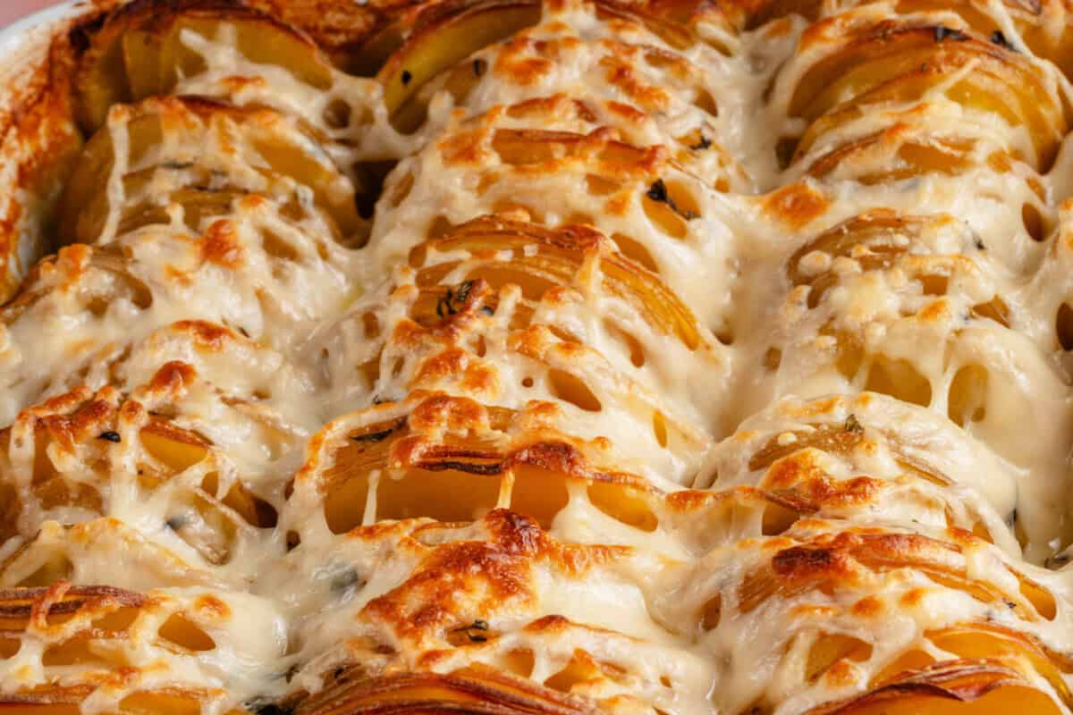 close up of baked Vegan Dauphinoise Potatoes with cheese on top