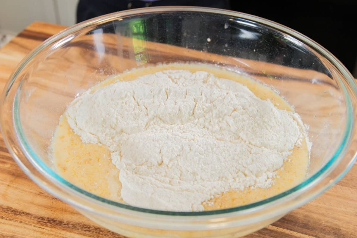 adding flour to the wet ingredients